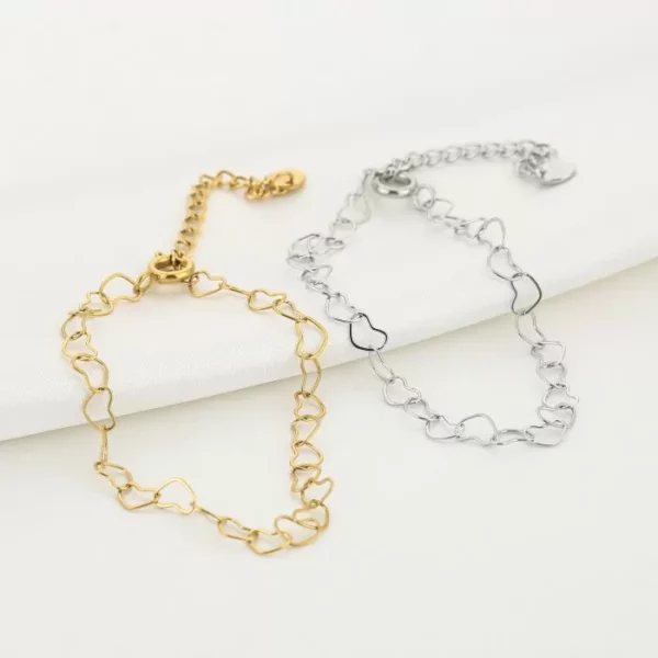 Hartjes schakel armband goud en zilver