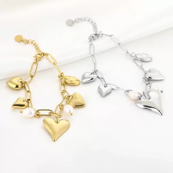 Statement armband met hartjes goud en zilver